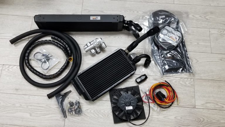 Full Oil cooler kit system consisting of a CSF right fender oil cooler and IROC front bumper oil cooler